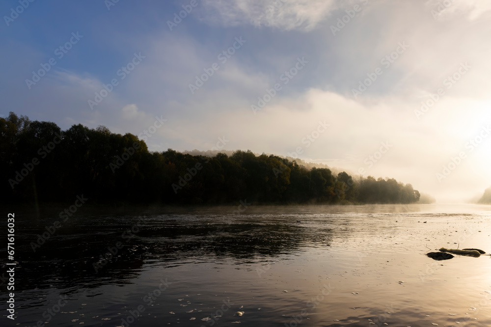 Small fog on the river in autumn Small fog on the river in autumn