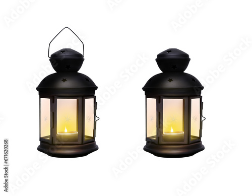 Obraz na płótnie A traditional festive Christmas lantern made from black wrought iron metal glowing from a lit Christmas candle isolated against a transparent background. w salonie
