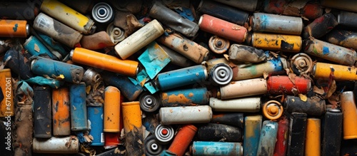 Various old batteries for recycling with different macro textures