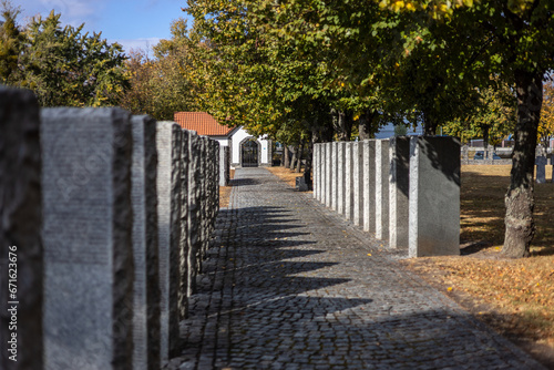 Kyiv. Kyiv region. Ukraine. 13.10.2023. Stone tombstones in the German cemetery in the fall. Beautiful German cemetery near Kyiv. Many dead German soldiers of the dead during the 2nd World War.