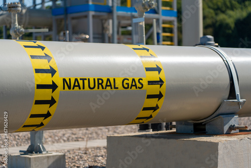 A gas pipeline with the big inscription natural gas photo