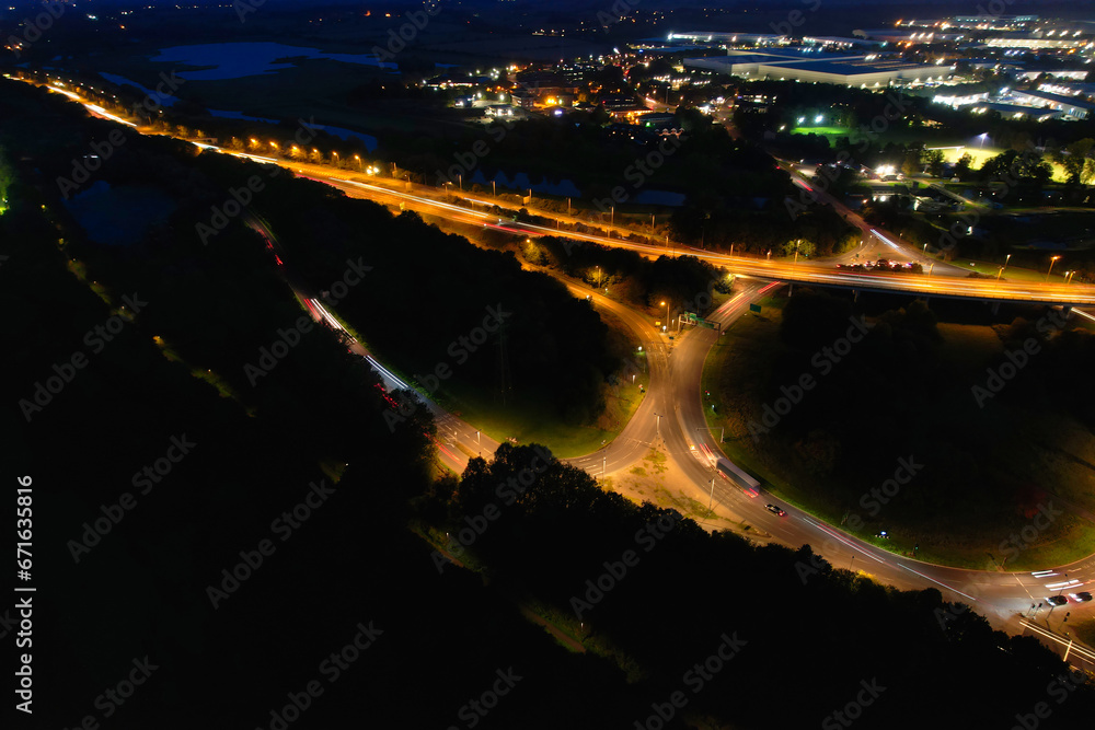 Gorgeous High Angle View of Illuminated British City at Just After Sunset Gorgeous High Angle View of Illuminated British City at Just After Sunset