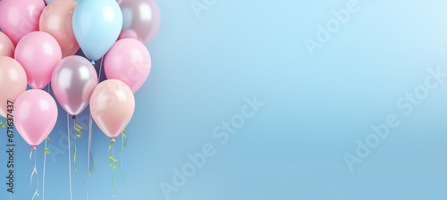 Pastel balloons on blue background. Birthday party background, Copy space.
