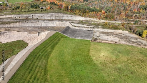 Hammond-Lakes Dam and Reservoir in Tioga, Pennsylvania peaceful lake and water in Autumn Fall colors in mountain trees in morning sunlight where boating and fishing is permitted