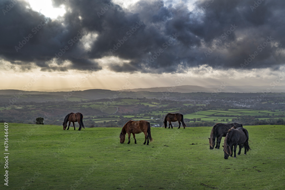 Evening storm clouds gathering over Tavistock and the Dartmoor hills Evening storm clouds gathering over Tavistock and the Dartmoor hills