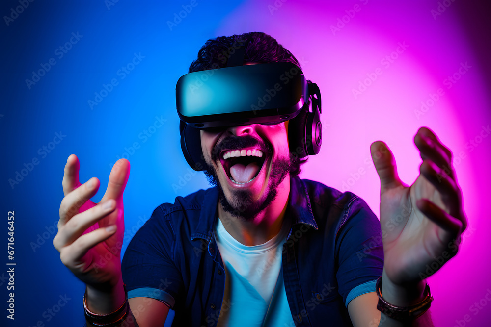 Latino guy wearing a VR headset enjoying hands-on virtual reality gaming fun, looking excited. Plain purple & blue background Latino guy wearing a VR headset enjoying hands-on virtual reality gaming fun, looking excited. Plain purple & blue background