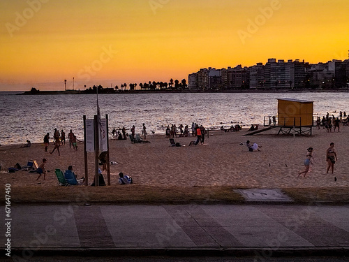 Pocistos beach at sunset, montevideo, uruguay photo