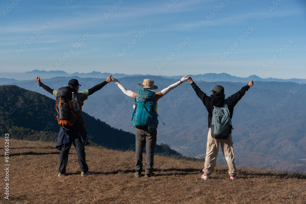 Woman hiking Hike in the mountains Woman traveler with backpack on beautiful summer landscape. Travel and Lifestyle Concept Woman hiking Hike in the mountains Woman traveler with backpack on beautiful summer landscape. Travel and Lifestyle Concept
