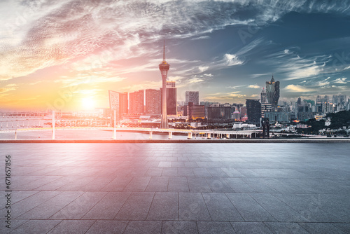 Square brick floor and Macau Financial District skyline background