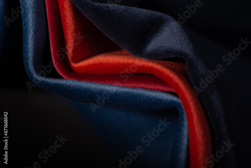 Bright collection of velour textile samples. Multicolor Fabric texture background. Abstract background with waved velour fabric.