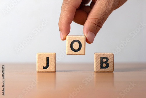 Job letter on wooden block on wooden table, business recruitment concept, job search