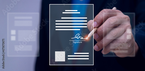 Stored electronic signature concept, electronic signature, businessman signing electronic document in digital document on virtual laptop screen
