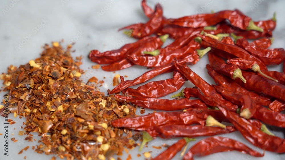 Spicy red chilli - cut and cook with chilli to make cuisine dishes spicy - Indian and meditarranean food Spicy red chilli - cut and cook with chilli to make cuisine dishes spicy - Indian and meditarranean food