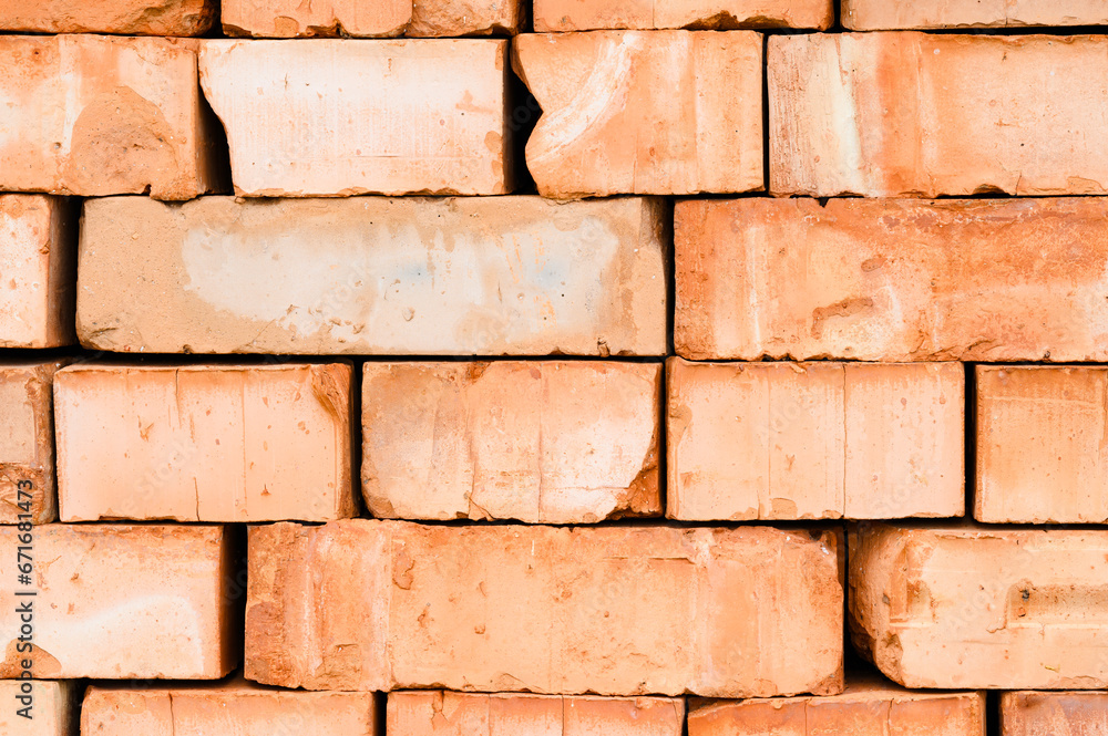 Obraz premium Textured background of stacked bricks