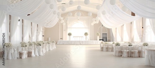 Elegantly adorned in white hues wedding venue photo