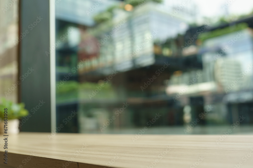 empty wood table by window in town empty wood table by window in town