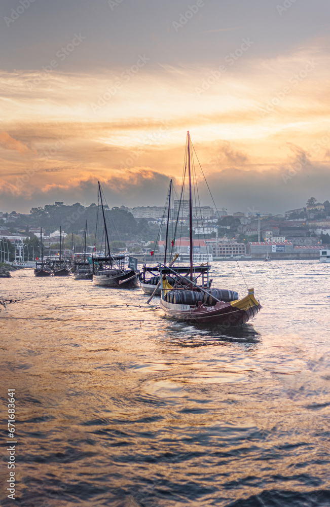 Sunset in the Douro, typical Porto boats known as 