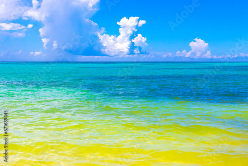 Tropical Caribbean beach clear turquoise water Playa del Carmen Mexico.