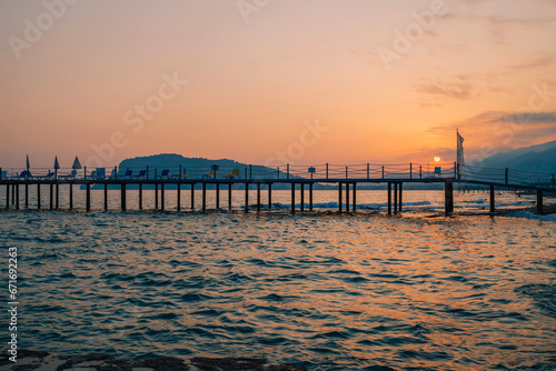 Fototapeta Naklejka Na Ścianę i Meble -  Beautiful eveining scene on Alanya beach in Turkey