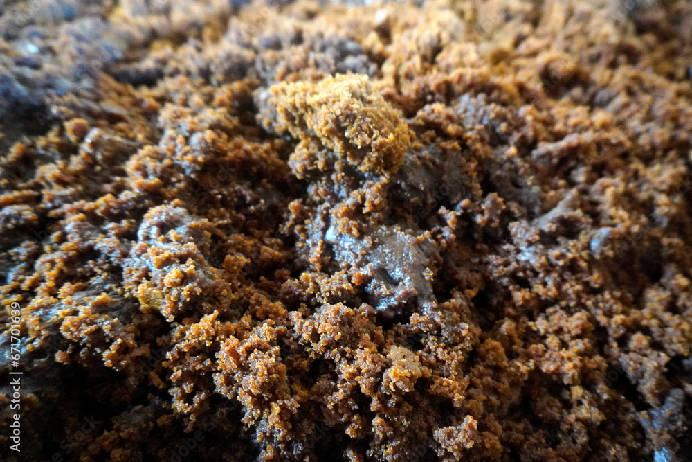 Wet brown soil texture, rough irregular texture details Wet brown soil texture, rough irregular texture details