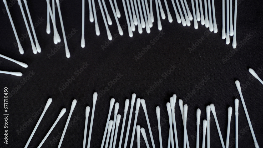 Cotton buds (korek kuping) are a mainstay for many people to clean the inside of their ears. Cotton bud with black background Cotton buds (korek kuping) are a mainstay for many people to clean the inside of their ears. Cotton bud with black background