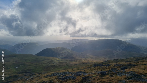 Beautiful views Aran Fawddwy mountain in southern Eryri (Snowdonia) National Park in Wales on a cloudy day photo