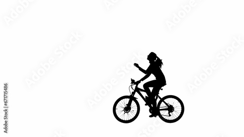 Portrait of female model. Black silhouette girl shakes her ponytail, riding a bicycle. Isolated on white background with alpha channel.