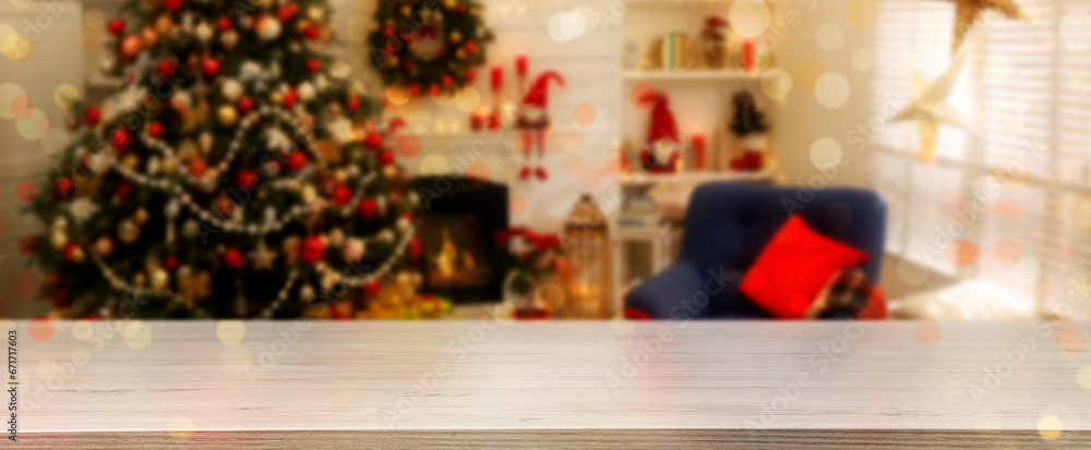 Empty white wooden table in room decorated for Christmas. Banner with space for design Empty white wooden table in room decorated for Christmas. Banner with space for design