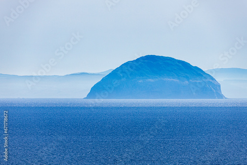 Obraz na plátně The island of Ailsa Craig photographed with a telephoto lens over 20 miles away