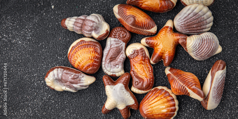 seashell candy chocolate sweet seashells dessert eating meal food snack on the table copy space food background rustic top view