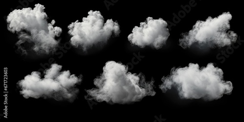 A captivating image of a bunch of white clouds against a striking black background. This picture can be used to create a dramatic and dreamy atmosphere in various projects