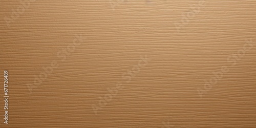 A detailed close-up view of a brown cardboard surface. This image can be used to represent packaging, shipping, recycling, or DIY crafts.