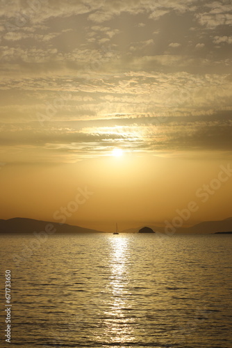 sunset on the beach. Seaside town of Turgutreis and spectacular sunsets. Selective Focus. © bt1976