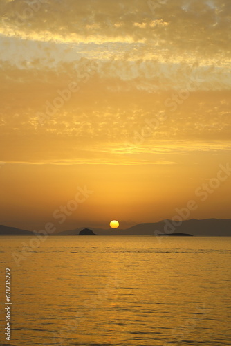 sunset on the beach. Seaside town of Turgutreis and spectacular sunsets. Selective Focus.