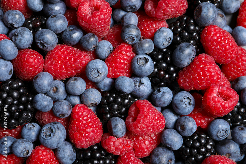 Assortment of fresh ripe berries as background, top view Assortment of fresh ripe berries as background, top view