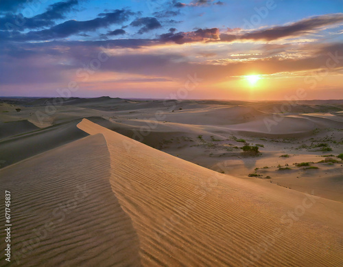 Sunset Over the Desert Dunes