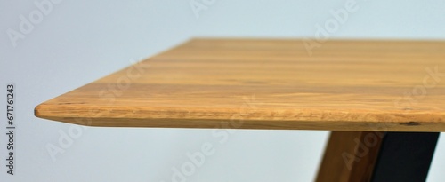 Wooden table surface. Natural wood furniture close view