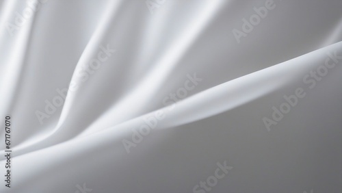 white satin background An abstract white background with some light and shadow effects. The background has a smooth and elegant feel