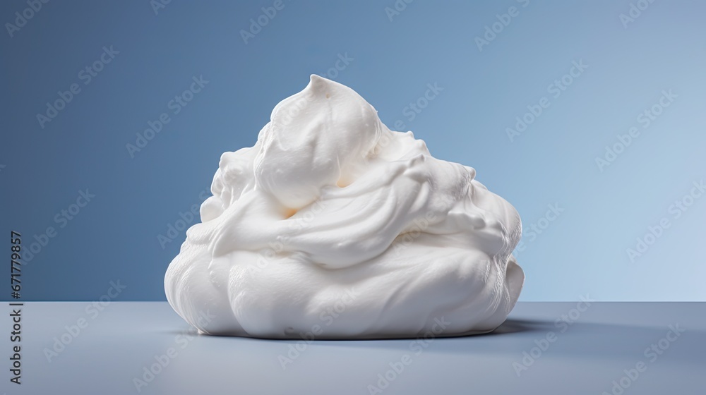 Obraz premium a pile of whipped cream sitting on top of a blue counter top next to a bottle of cream on top of a table. generative ai