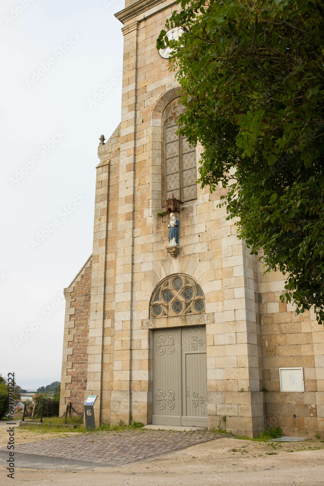 Entrance of the Church of St Samson Notre Dame de Beauport in Paimpol, Cotes-d'Armor, Brittany, France. Vertical shot.