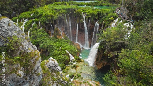 Fototapeta Naklejka Na Ścianę i Meble -  Plitvice lakes National park with waterfalls in Croatia. Mountain landscape, stream flow with azure clear water. Summer travel destination.