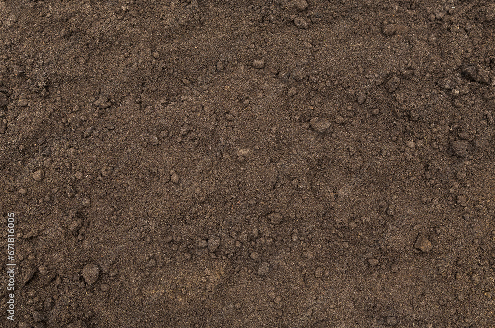 Brown soil ground abstract texture background with copyspace top view Brown soil ground abstract texture background with copyspace top view