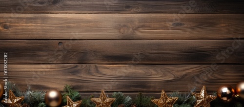 Tree shaped Christmas ornaments against a backdrop of weathered wooden planks
