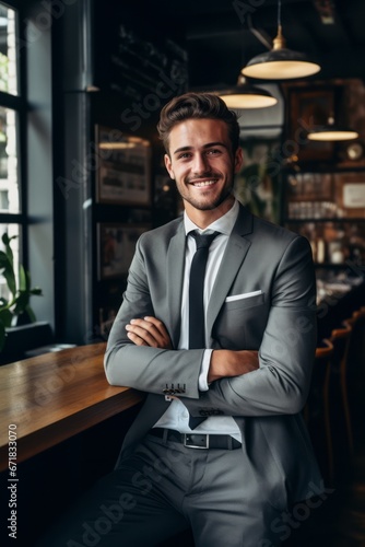 A youthful and attractive male entrepreneur embracing positivity and seeking new opportunities.