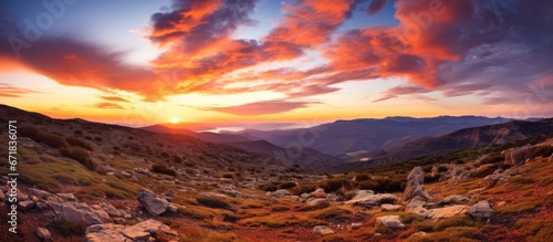 The sun going down over the mountain range in Sierra Nevada Spain