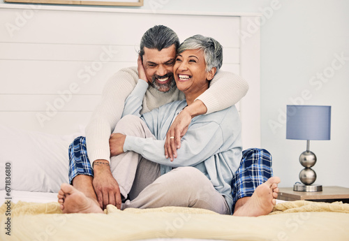 Hug, happy or old couple in bed to relax, enjoy romance or morning time together at home in retirement. Embrace, senior woman or funny elderly man laughing or bonding with love, support or smile