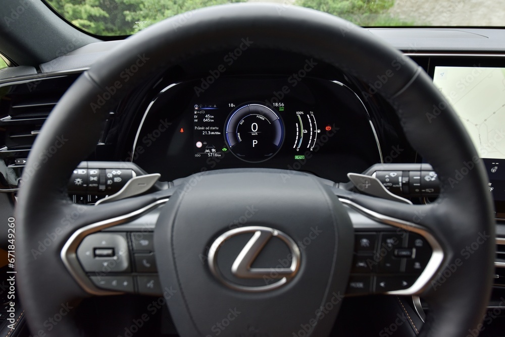 Lexus RX 450h+. A luxury car with a plug-in hybrid drive. Cabin ...