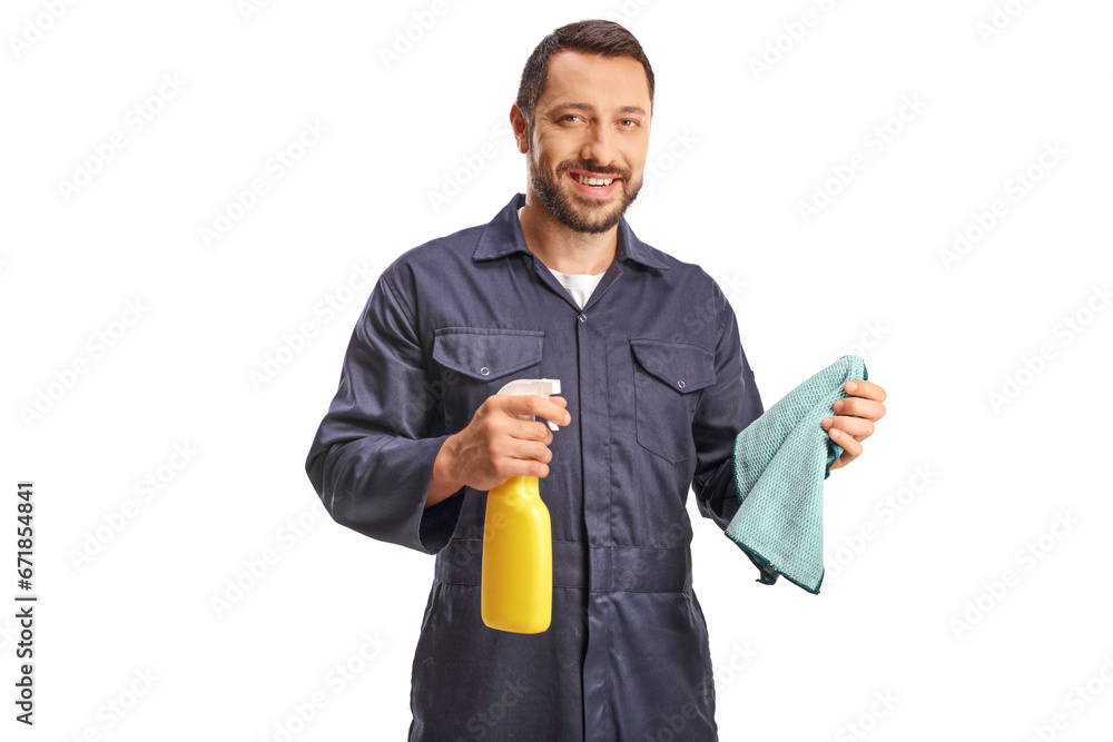 Mechanic holding a wiping cloth and a cleaning spray Mechanic holding a wiping cloth and a cleaning spray
