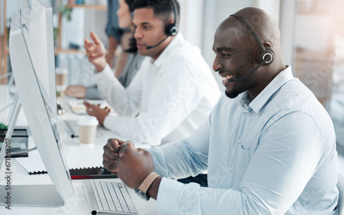 Success, consulting and call center with black man at computer for deal, customer service and telemarketing. Happy, winner and target with consultant in office for technical support, sales and goals
