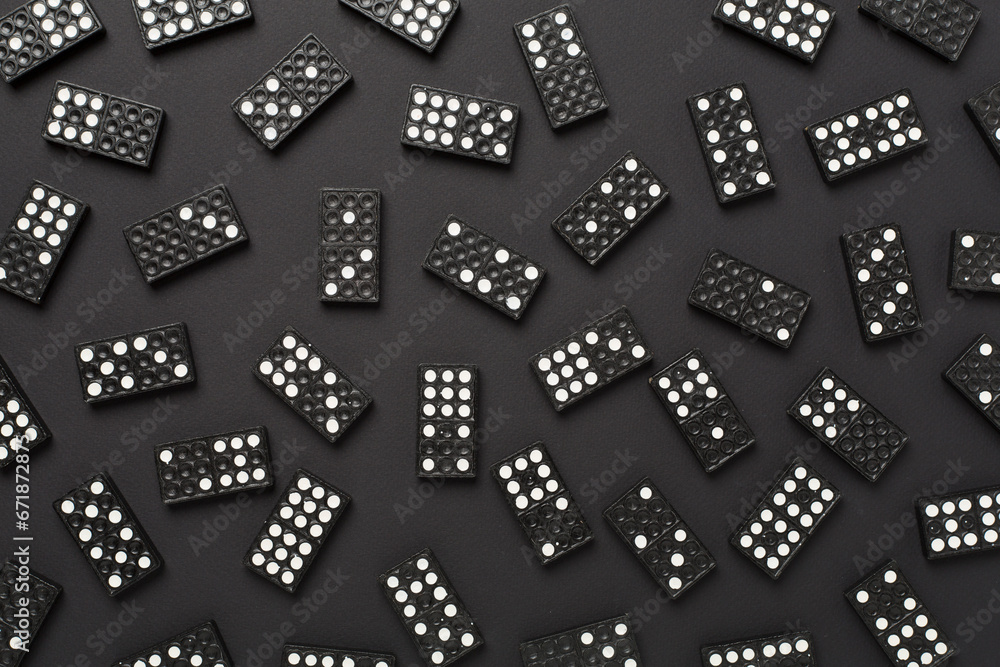 Black domino tiles on color background, top view Black domino tiles on color background, top view
